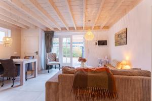 Welcome in - Vakantiehuis Schoolstraat 6a I Vrouwenpolder met royale tuin