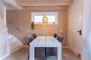 Welcome in - Vakantiehuis Schoolstraat 6a I Vrouwenpolder met royale tuin