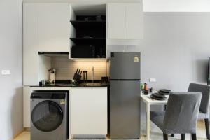 Premium 1BR at Title Legendary Bangtao C407