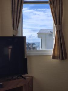 The Dancing Dolphin, 124 Aber Bay Holiday Park, Clarach, Aberystwyth