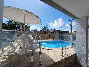 Apartamentocamboinhapraiapiscinaeconforto