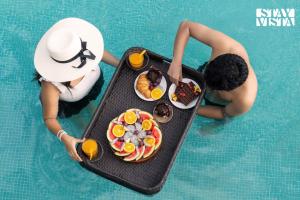 StayVista at Acasa with Pool, Lawn