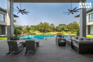 StayVista at Acasa with Pool, Lawn