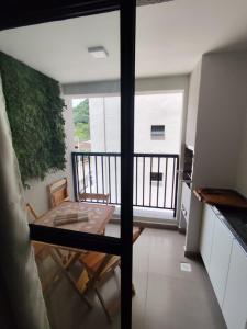 lindo apartamento 2 dormitórios martim de sá pé na areia 32 C Juliana