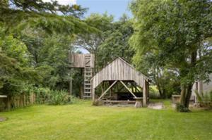 House with large garden, campfire hut