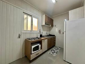 Uma quadra do mar, mobiliado, excelente localização