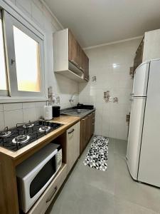 Uma quadra do mar, mobiliado, excelente localização