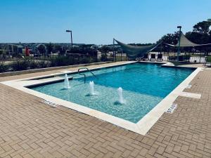 The Cozy Cloud with Pool and Hot Tub