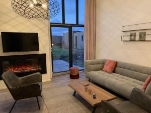 Enkhuizer Strand Cube Elite Paradiso mit Zaun Haus Nr 211