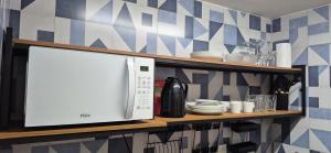 Capital 307 - Sala, Cozinha e Quarto com Banheiro