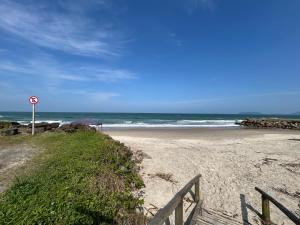 Lindo apartamento de frente para o mar