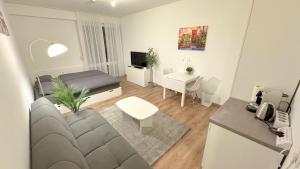 Modern, quiet apartment right by S-Bahn - close to Munich & airport
