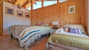 ArboLodge Mágica cabaña entre lago y mar