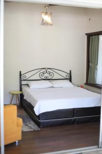 Detached villa with a heated pool and garden