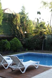 Detached villa with a heated pool and garden