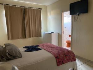 Quarto econômico no centro