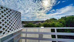 Encantadora Casa con Balcón a Pasos del Mar