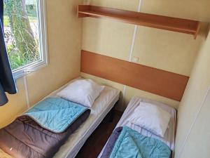 Mobil home confortable avec terrasse pour 6 personnes - API-1-52-882