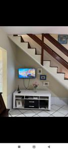 Meu Aconchego Casa Duplex com Piscina e Salão de jogos, 400mt da Praia