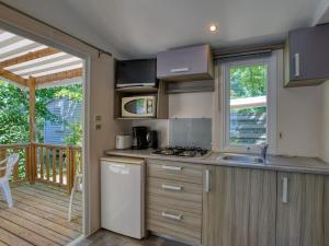 Charmant Mobil-home avec terrasse à Groléjac - API-1-52-1141