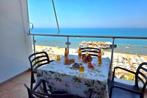 Beachfront & Sea View Apartment 101 - Happy Rentals