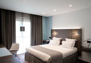 Hotels La Pyramide - Maison Henriroux : photos des chambres