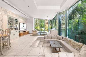 Sunlit Glasshouse Oasis with Private Pool
