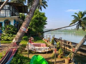 RivoGoa Homestay - riverside cottage near mopa airport