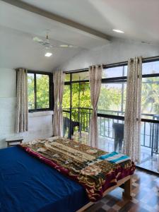 RivoGoa Homestay - riverside cottage near mopa airport