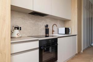 Comfortable Studio in Katowice with Gym Sauna & Cinema by Noclegi Renters