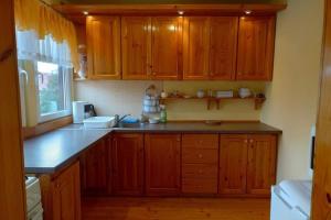 Half of a holiday home, large garden, terrace