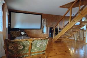 Half of a holiday home, large garden, terrace