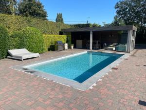 Holiday home with pool and large garden