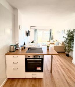 Charming Apartment in Benalbeach with Garden and Sea View