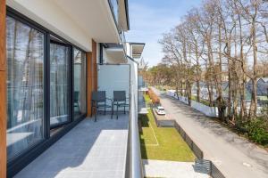 Charming Little Laguna Apartment with SPA & Fitness by Noclegi Renters