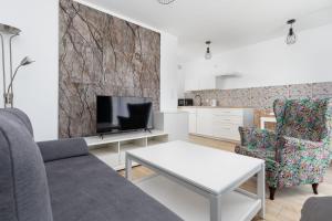 Charming Little Laguna Apartment with SPA & Fitness by Noclegi Renters