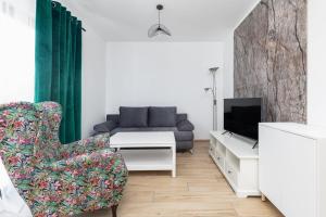 Charming Little Laguna Apartment with SPA & Fitness by Noclegi Renters