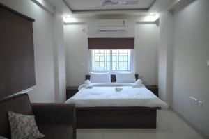 Yuvi Grand Residency