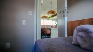 Edifício Promenade 3 Apt 702-Mandi Hospitalidade