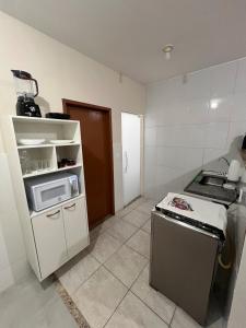 Refúgio Aconchegante à 6 min da Praia com Ar Condiconado - Wi-Fi