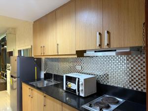 PinkdoorZ Moa Staycation at Shell Residences