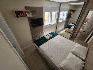 Apartamento de frente, PRÉDIO NOVO, centro da cidade e próximo a praia