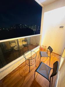 Chic 2 BHK with Balcony & Bold Yellow Lounge Powai