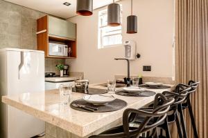 Frente a praia Embaré| Vaga + Ar Cond+ Lava e Seca