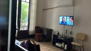 Bed in a room 2 blocks from Tres Cruces and PB