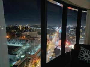 Minimalist 1BR Condo with NETFLIX at AEON TOWERS near Abreeza Mall by Rico