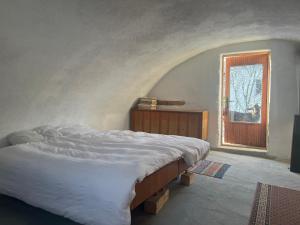 Cozy 100-year-old granary with a stove and goats