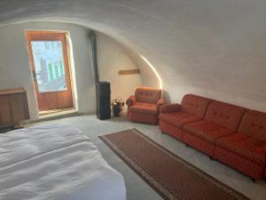 Cozy 100-year-old granary with a stove and goats