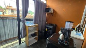 Studio Aconchego da ilha c ar-cond