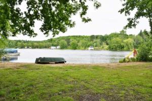 Modern 4BR Lake Escape with Patio & BBQ Area